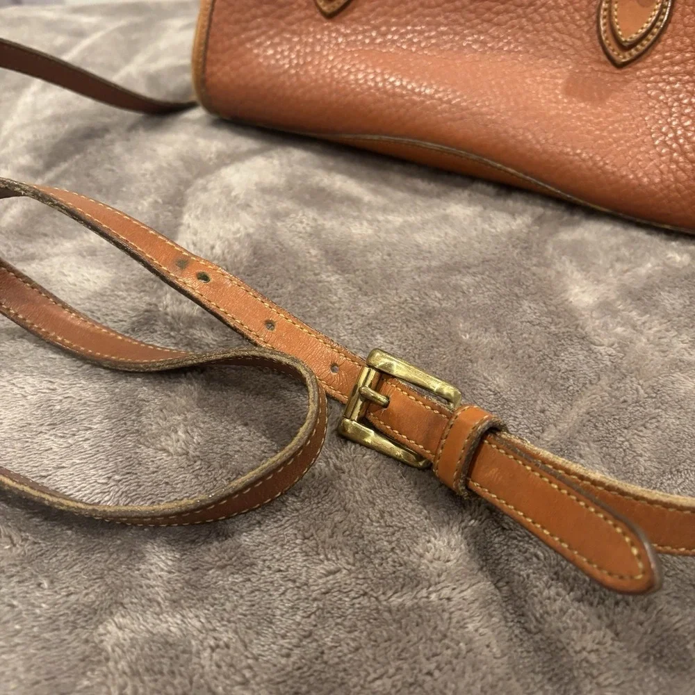 Dooney & Bourke flaws missing
